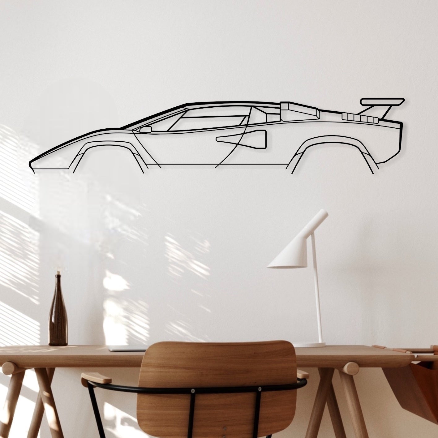 Lamborgini Countach auto metal wall art hung in office.