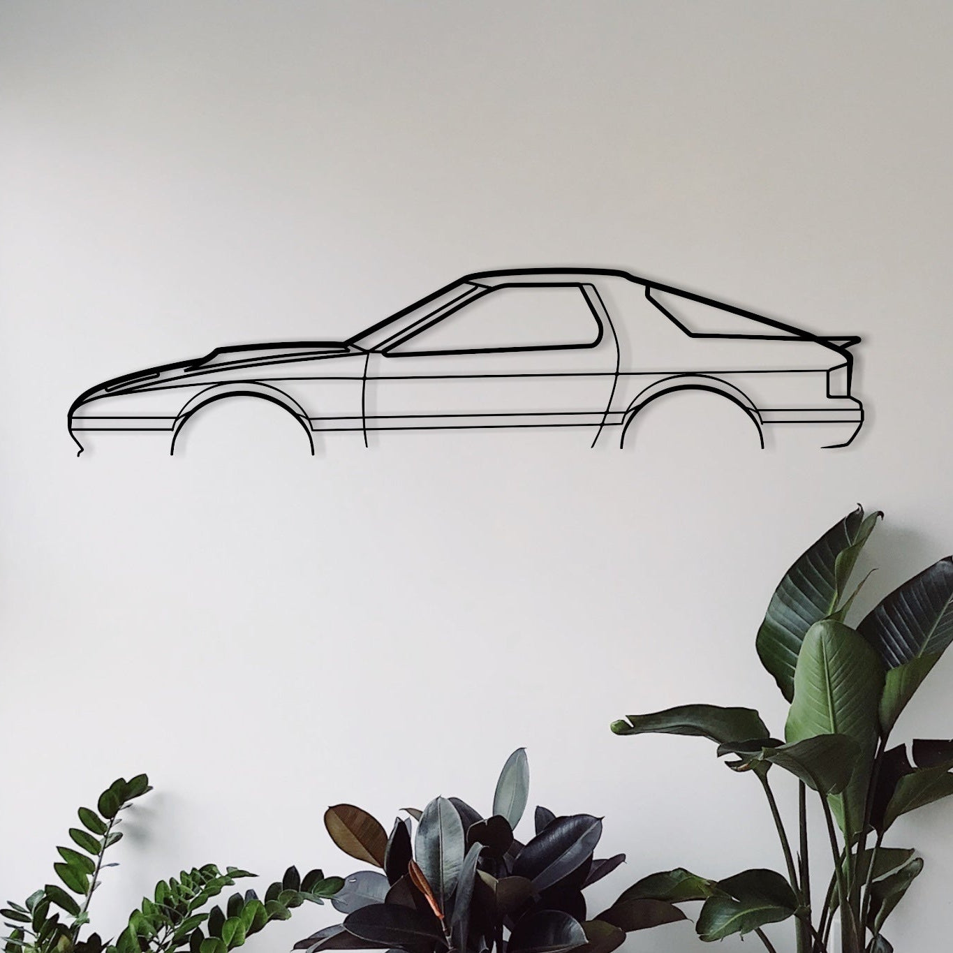 Mazda RX7 Series 4 automotive metal wall art hanging in living room.