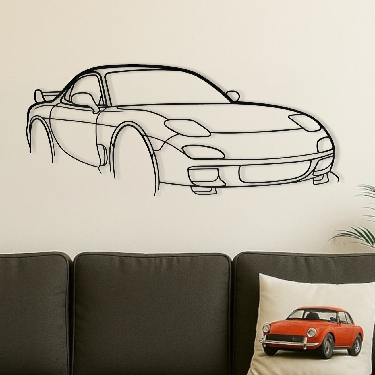 Living room with a gray sofa, wooden coffee table, and car-themed decor.