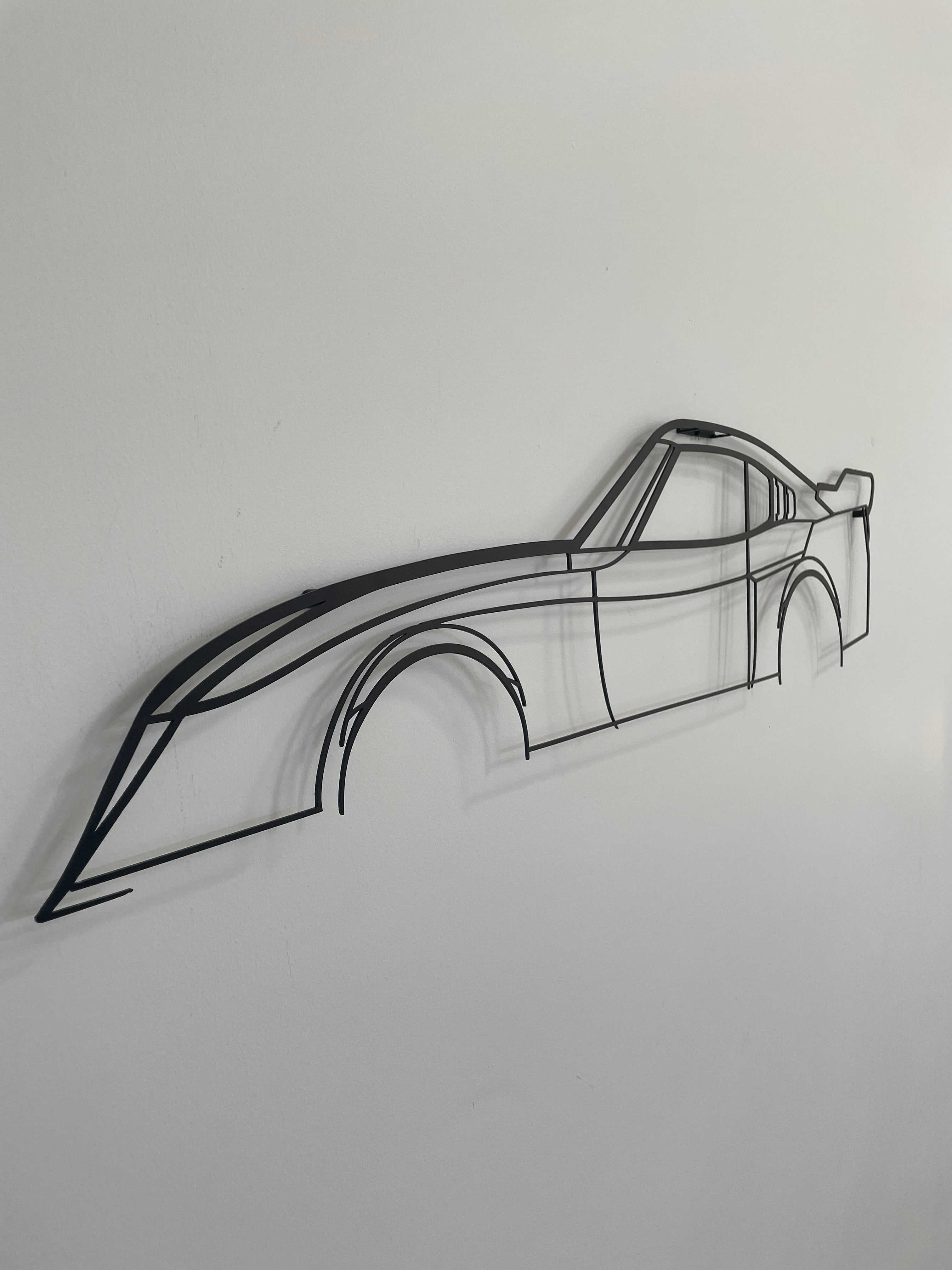 Side on view of the Toyota Celica LB metal silhouette wall hanging.