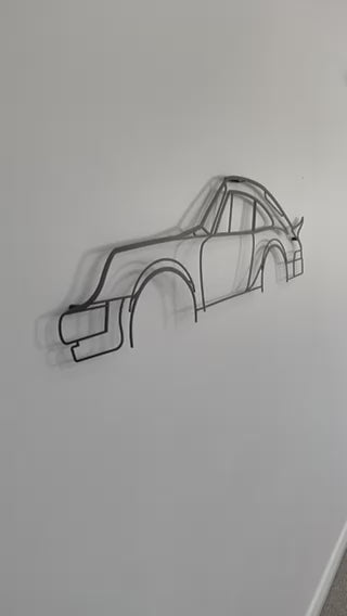 Close up and side on of Porsche 911 1980 Turbo metal car silhouette
