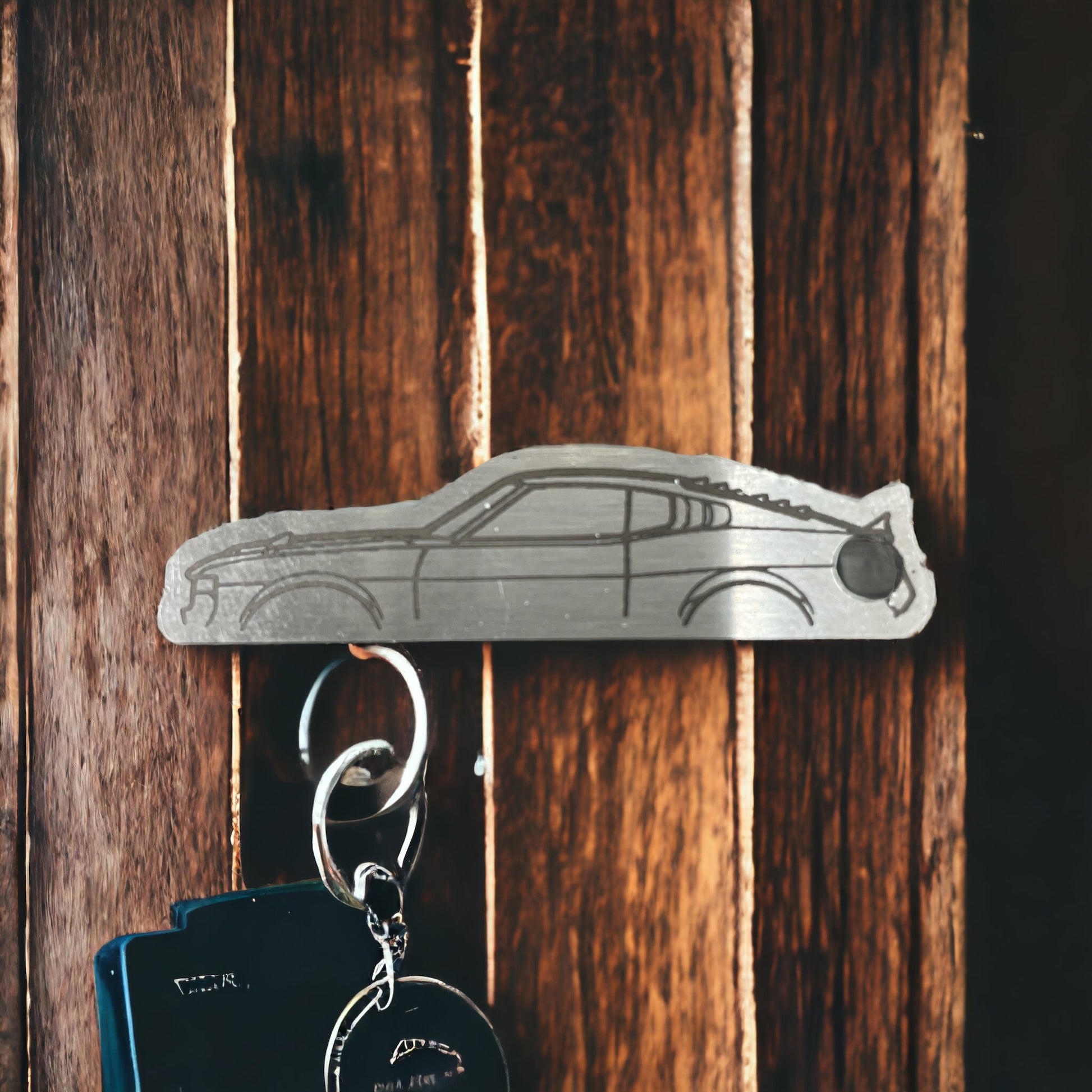 Custom ToyotaRA28 Key Ring on a wooden background.