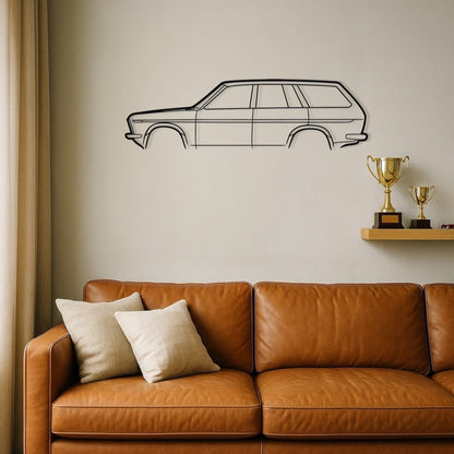Brown leather sofa with decorative pillows against a wall with a car outline and trophies on a shelf.