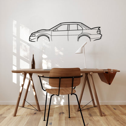 Wooden desk with chair against a wall with a car outline.