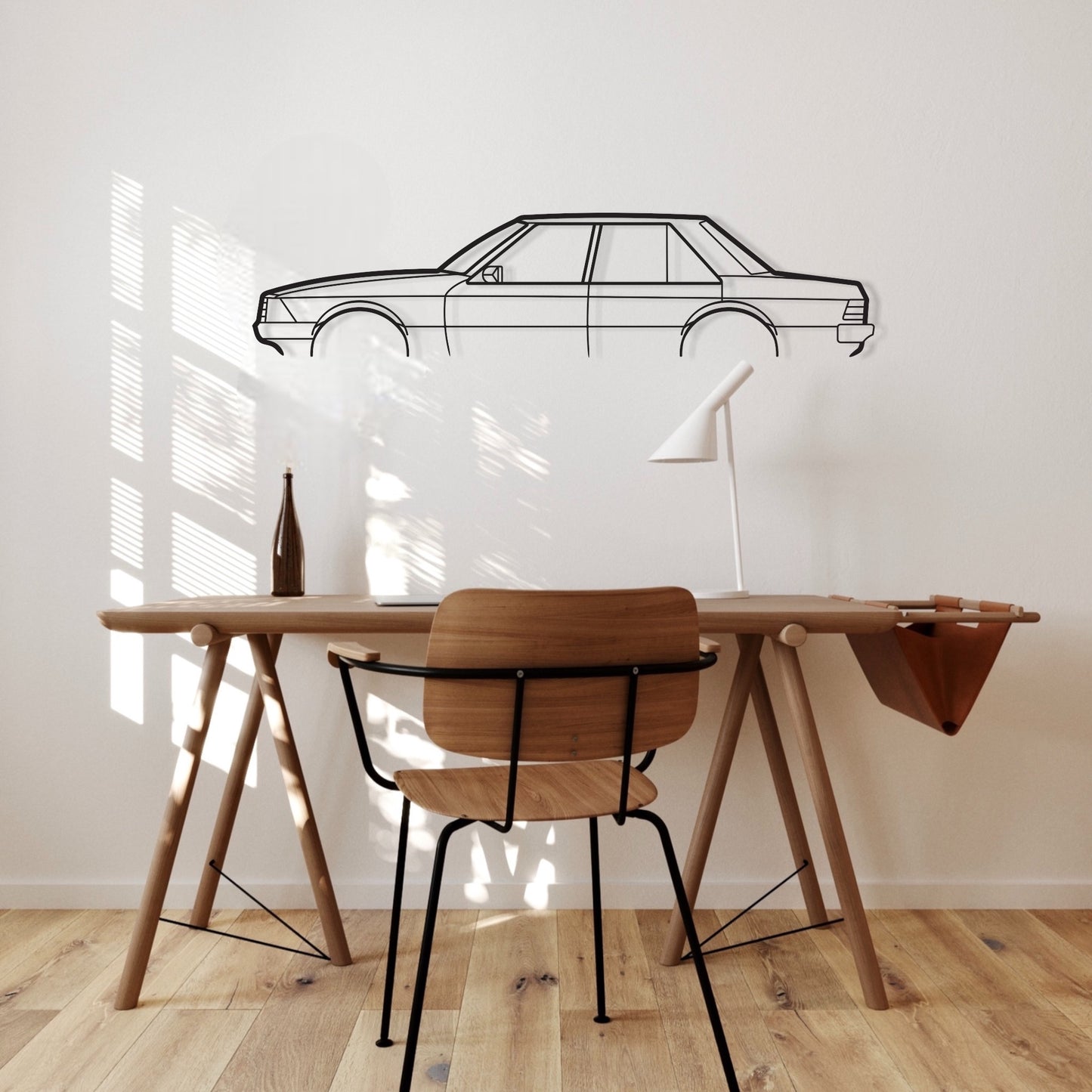 Ford Falcon XE/XD Metal Car stencil wall art hanging above an office desk.