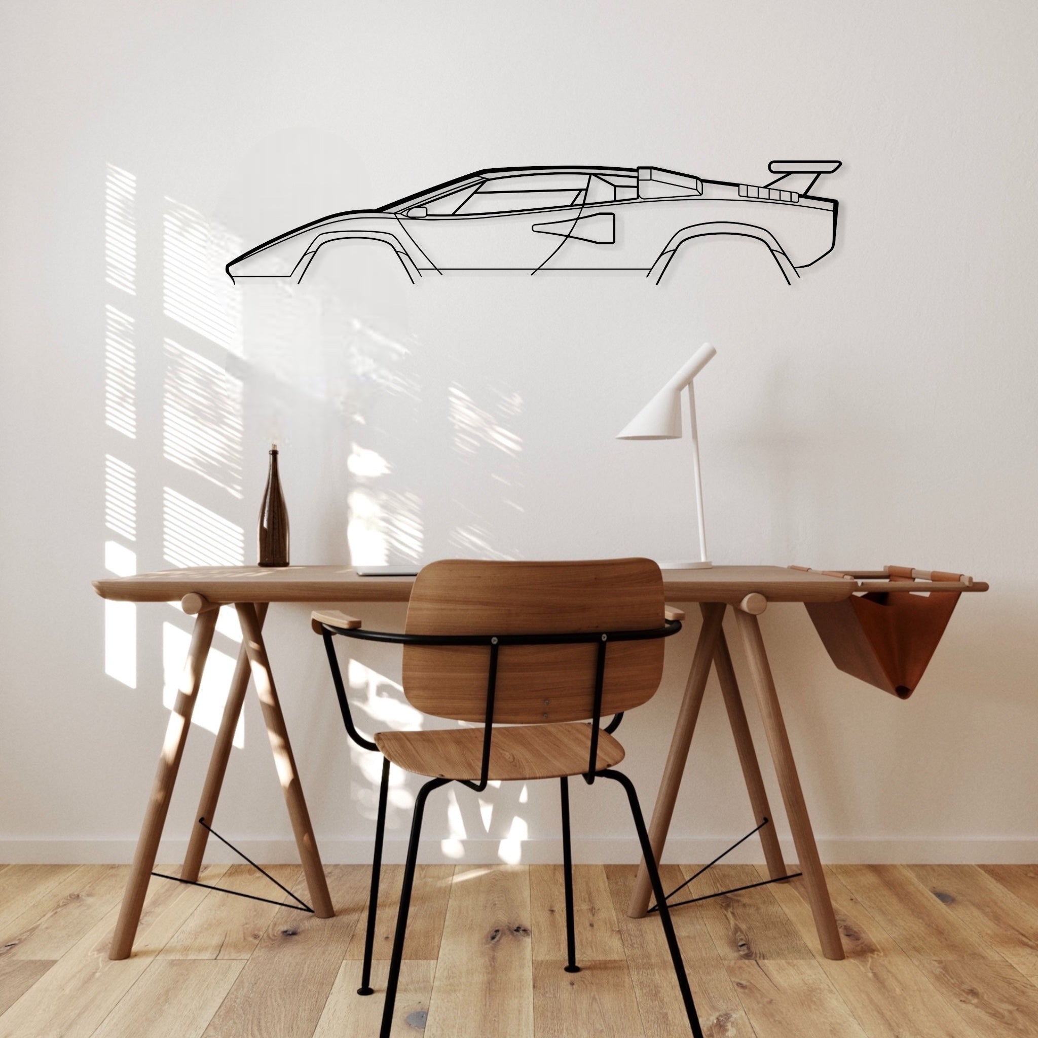 Lamborgini Countach auto metal wall art hung in office. 