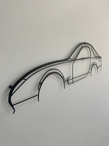 Mazda RX7 Series 6 FD side-on, hung on a white wall.