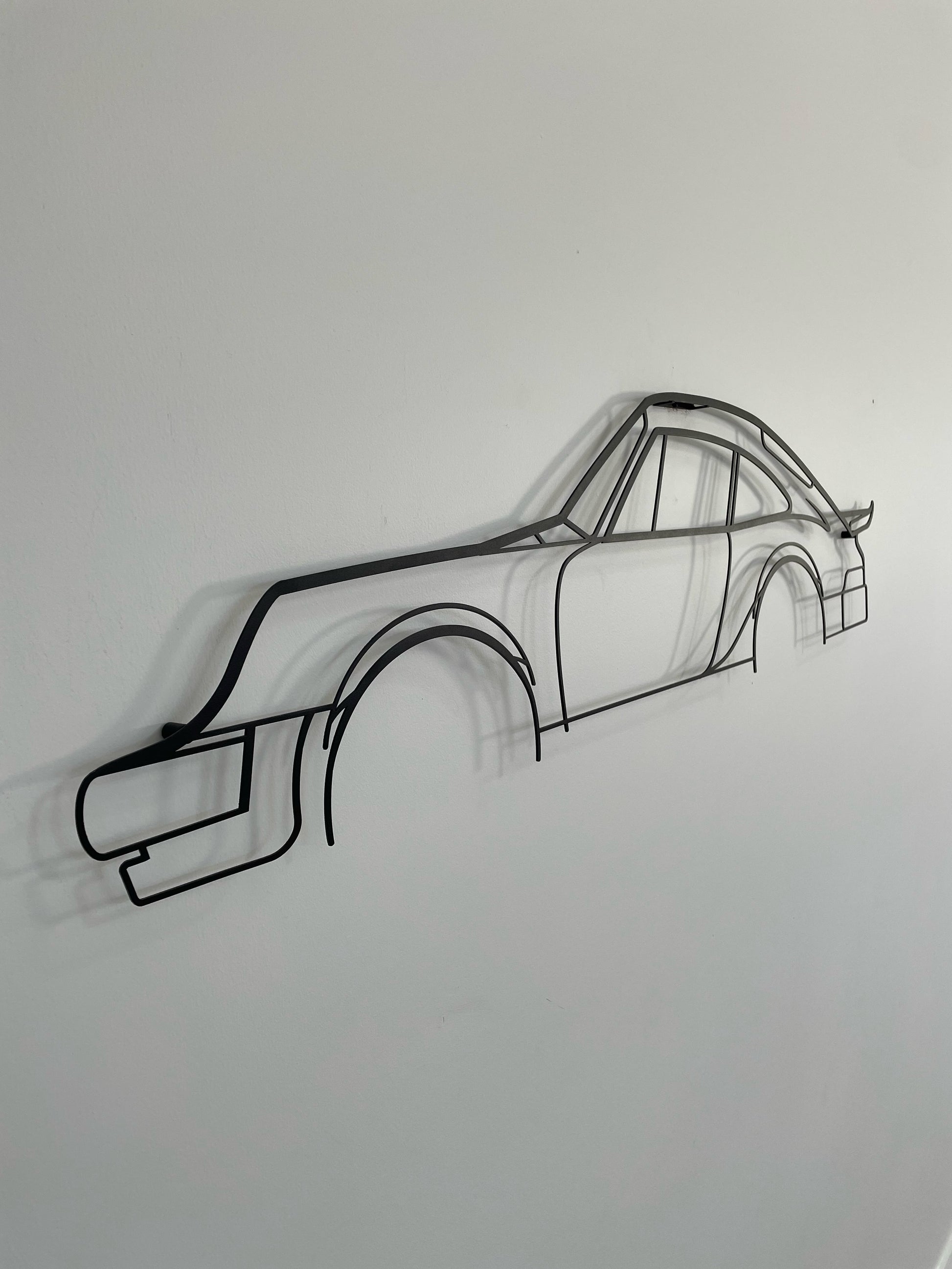 Side on of the large Porsche 911 Turbo Flat Wing metal wall art