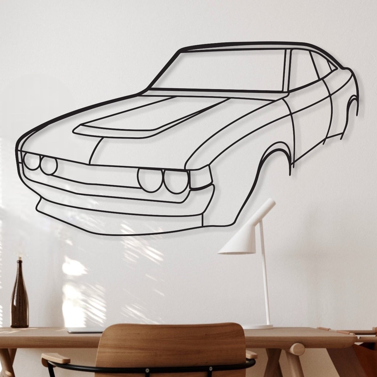 Toyota Celica RA28 Perspective car silhouette wall art hangs in an office. 