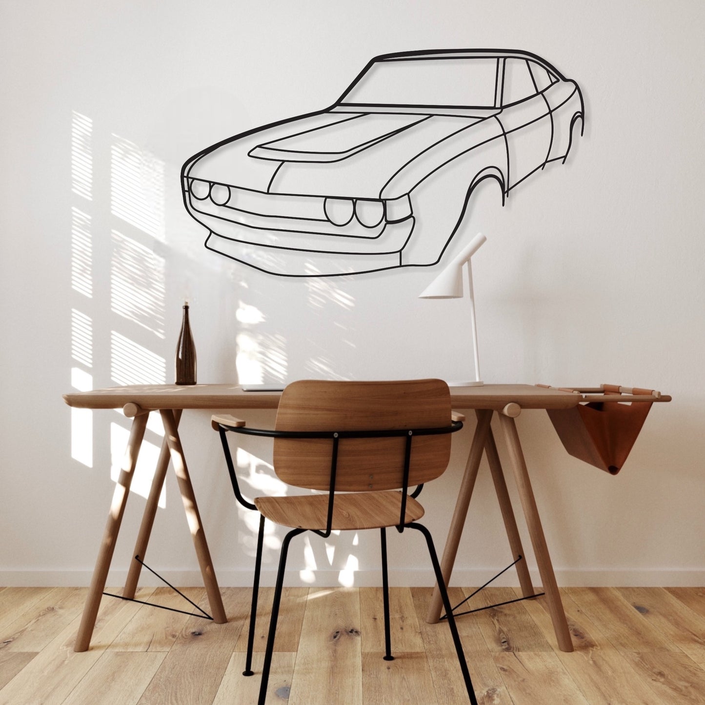 Toyota Celica RA28 Perspective car silhouette wall art hangs in an office. 