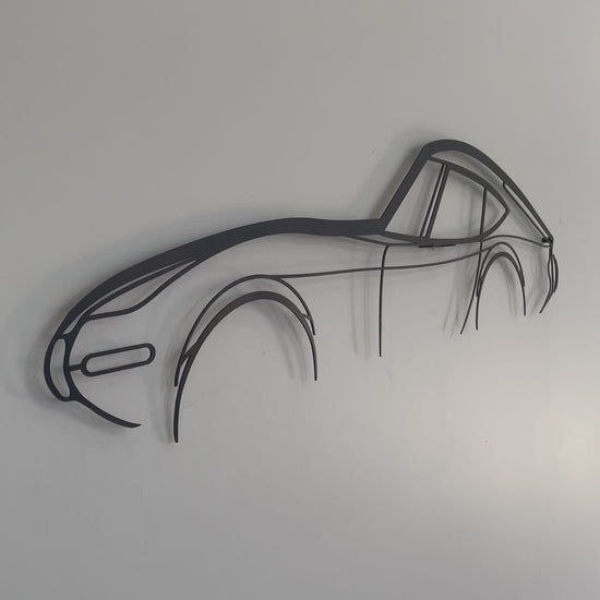 Close up and side on of Toyota GT 2000 car outline wall piece