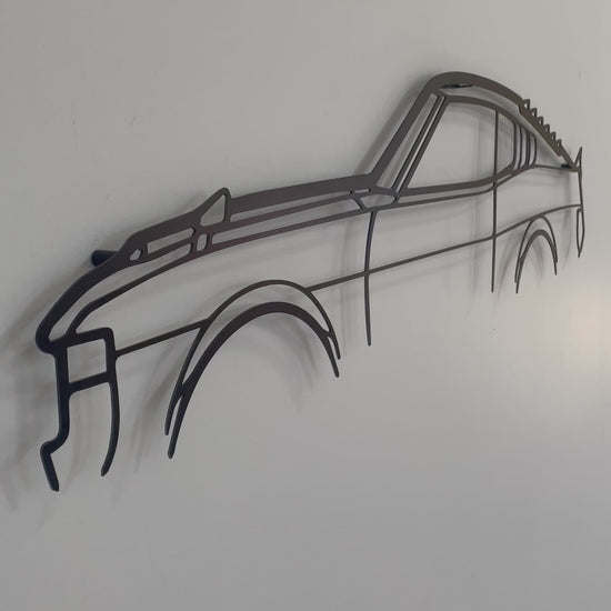 Side on and close up of Toyota Celica RA28 Hatchback metal wall art