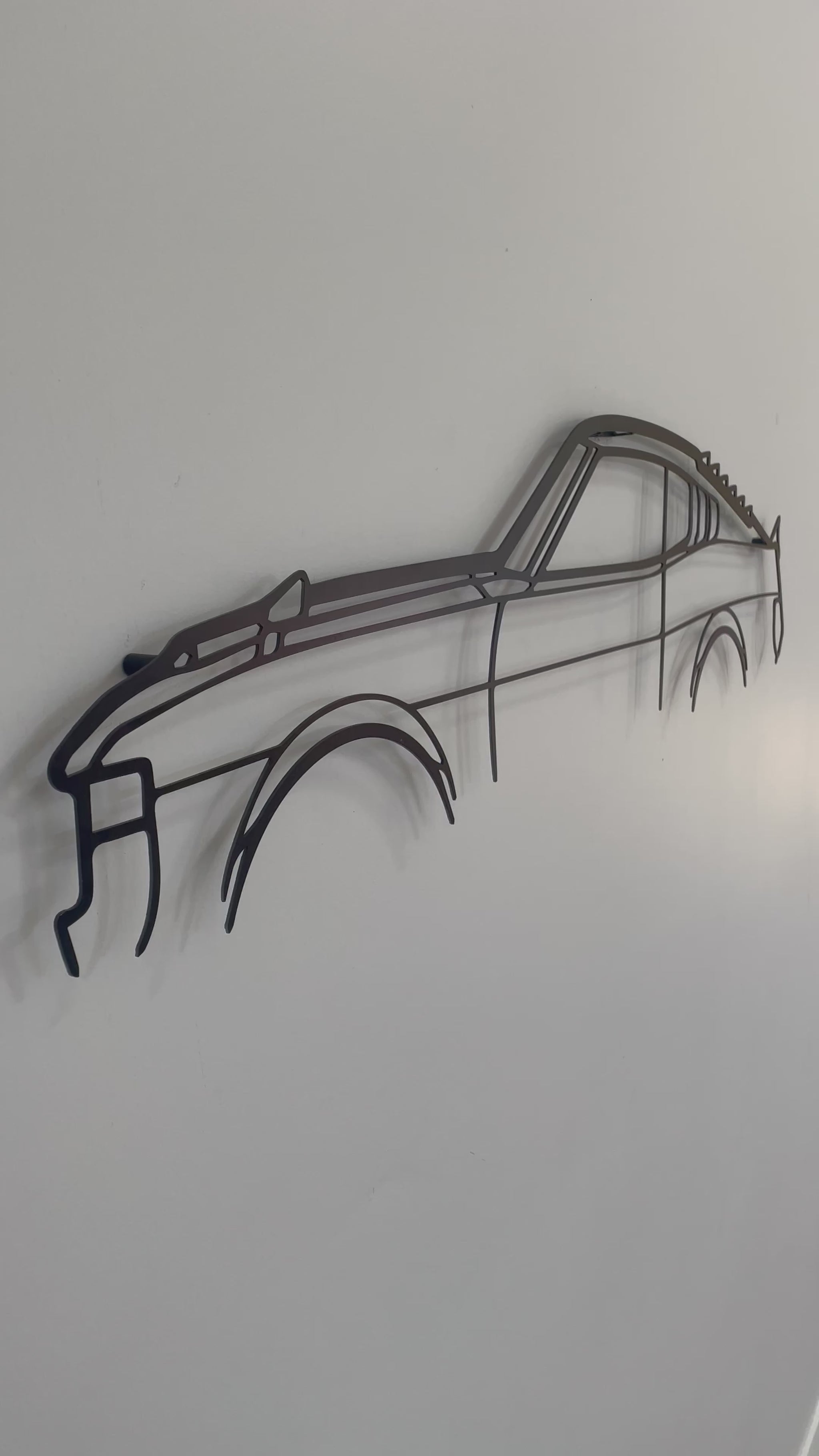 Side on and close up of Toyota Celica RA28 Hatchback metal wall art